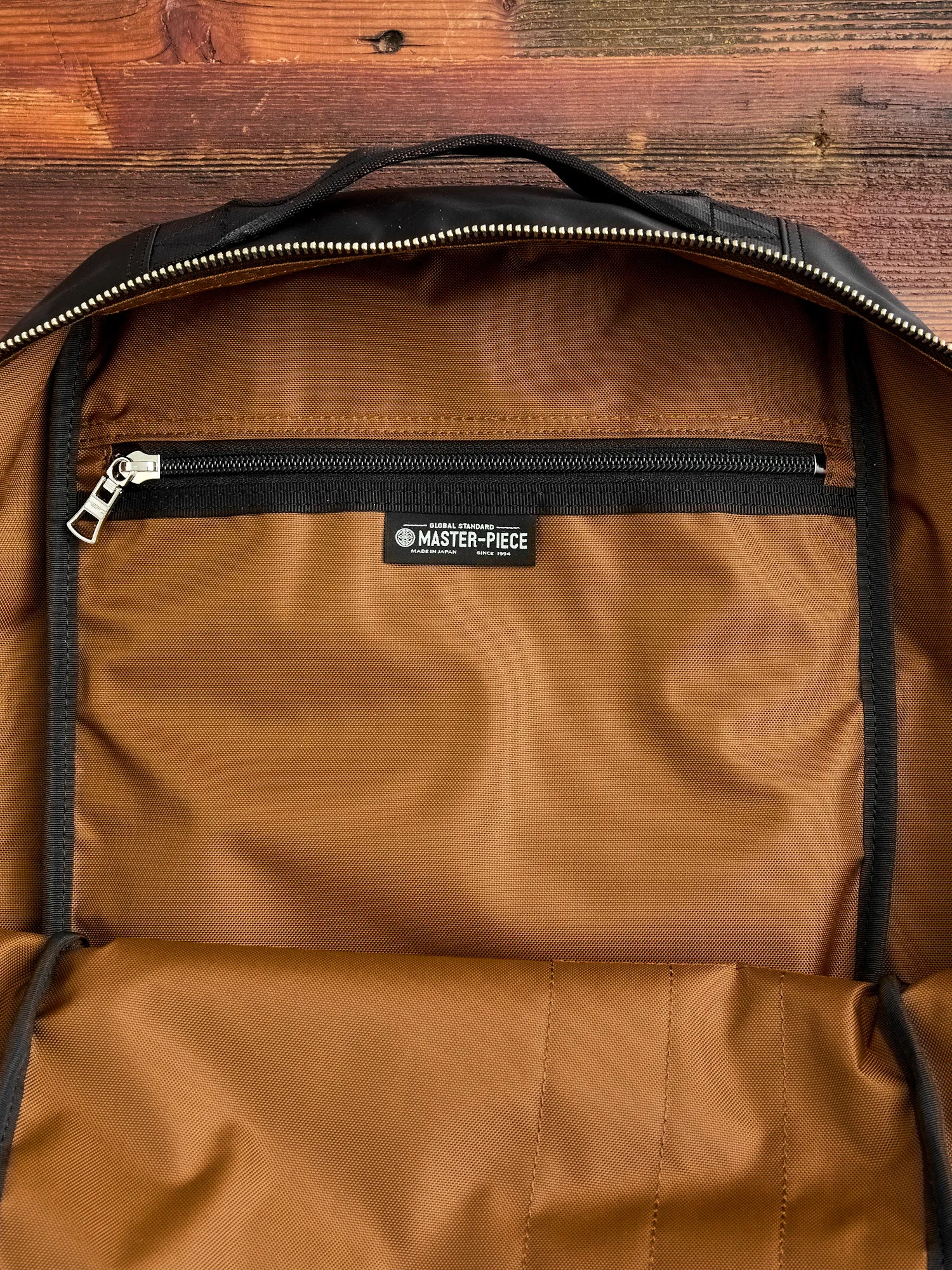 Lightning Zip Backpack in Black